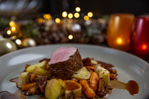 Veal tenderloin with roasted vegetables and chanterelles