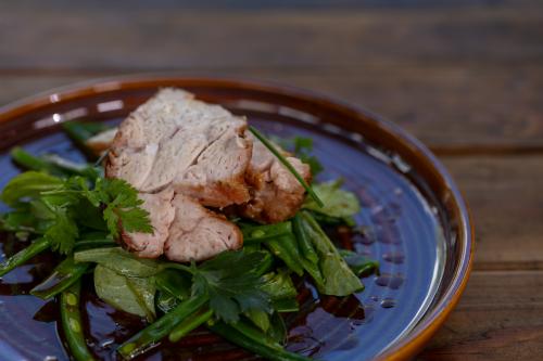 Roasted veal sweetbread on a green salad