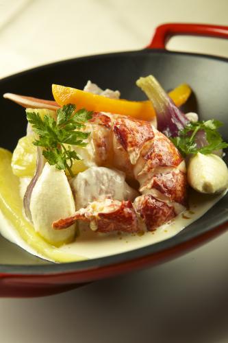 Blanquette van bloemstuk met kreeft
