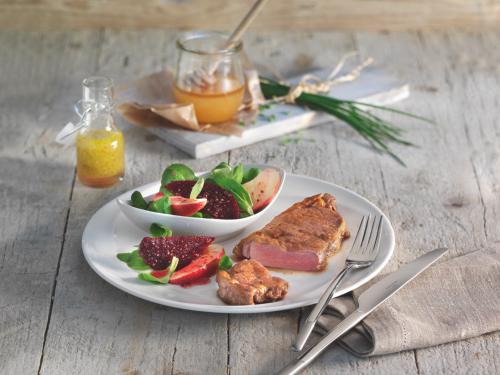 Veal steak with red beetroot and apple salad