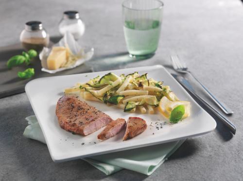 Sautéed veal schnitzel in truffle marinade with lemon and zucchini paste