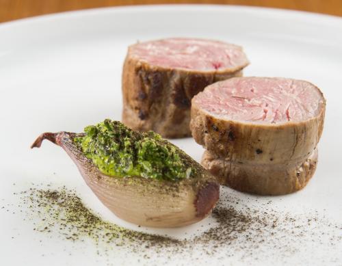 Veal tenderloin rôti with shallots and green herb emulsion