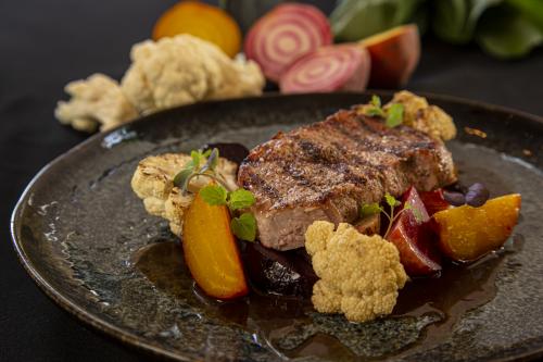 BBQ - Veal striploin steak with cauliflower and a beetroot variation