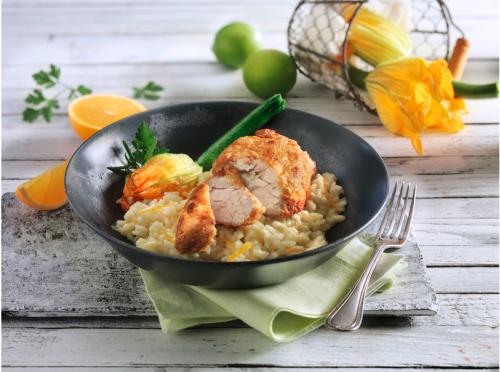 Roasted sweetbread with risotto and zucchini flowers